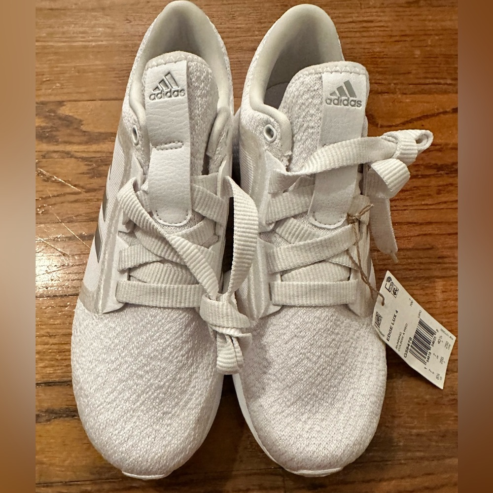 Adidas white Running shoes, has never been worn, size 8 1/2.